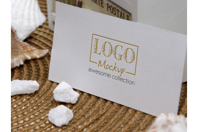 Logo Mockup on White Stones and Seashels